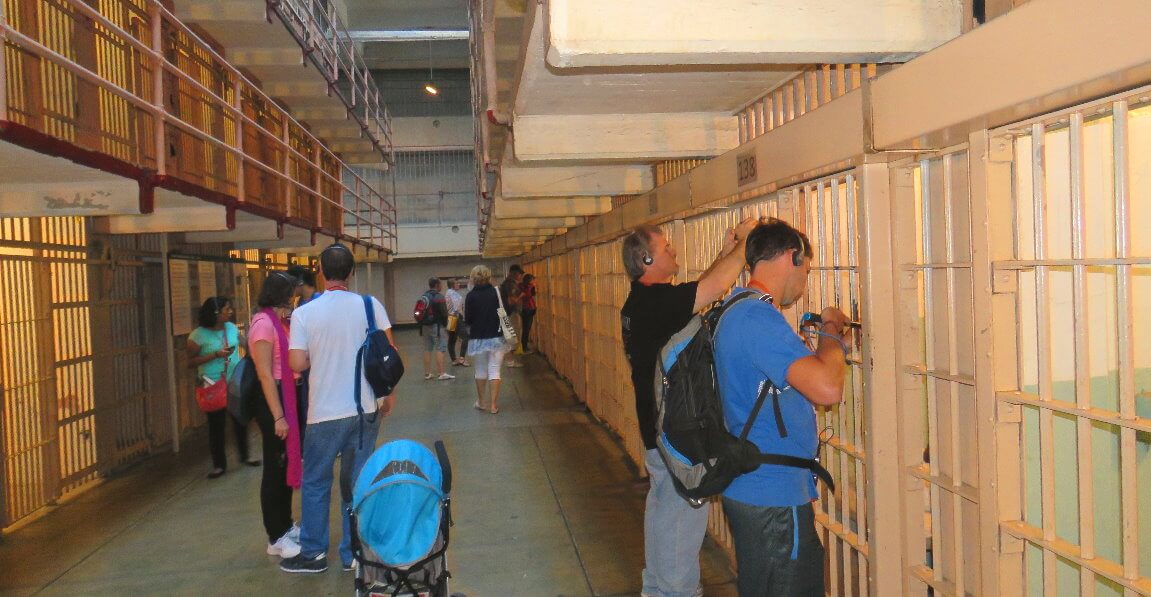 visitors_walk_in_the_cell_blocks_at_alcatraz_federal_prison_on_alcatraz_island_san_francisco_ca
